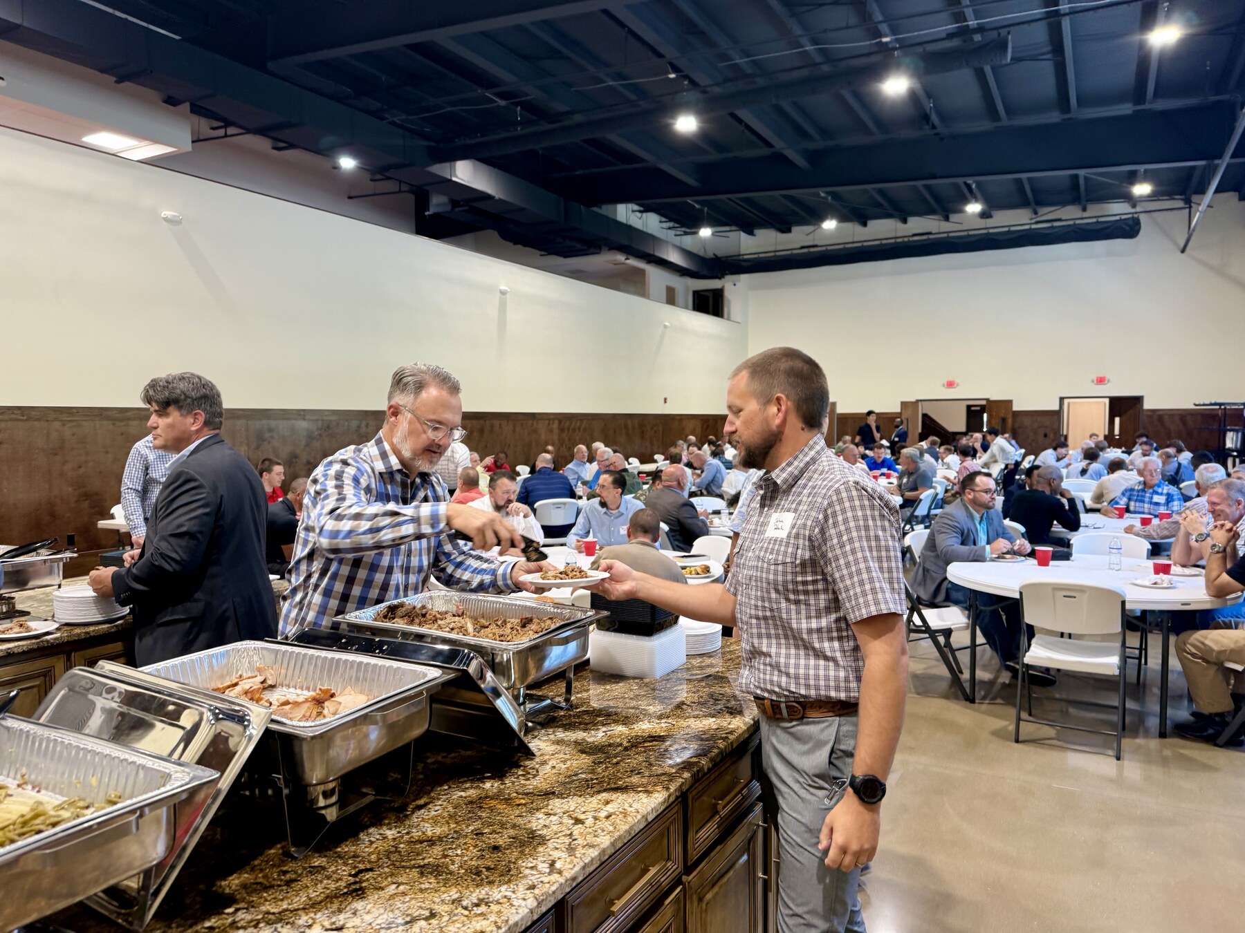 Church members enjoying a meal and fellowship